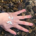 Sonnencreme im Wasser